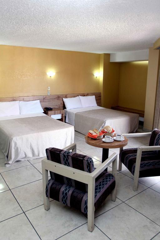 Hotel Universo Гвадалахара Номер фото